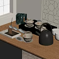 Traditional Tea Set with Teapot Teacups and Iron Kettle on Wooden Table by Window