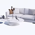 Gray Sofa and White Oval Coffee Table Set with Decorative Pillows Dried Flowers and Open Book