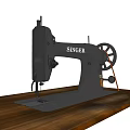 Heavy Duty Black SINGER Industrial Sewing Machine On Wooden Table