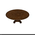 Round Wooden Dining Table With Intricate Carved Design And Decorative Base