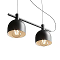 Two Modern Black Dome Shaped Pendant Lights Hanging On Black Rod With Illuminated Bulbs