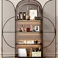 Elegant Decorative Cabinet With Glass Shelves Holding Wine Bottles Glassware And Photo Frames
