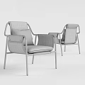 Modern Leisure Chair With Gray Orange Cushion Black Metal Frame And Side Pocket