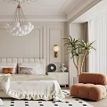 Elegant Bedroom With Tufted Headboard Cream Bedding White Ball Chandelier Orange Armchair Black White Pattern Rug