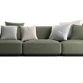 Cozy Green Three Seater Sofa With Multiple Cushions In Various Soft Tones