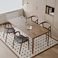 Wooden Dining Table Set With Four Gray Chairs Plant Vase Magazine Candles On Checkered Rug
