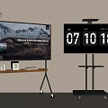 Poliform TVs With Mobile Wooden Stand And Black Stand Displaying Mountain Landscape And Time