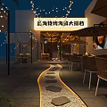 Cozy Night Seafood Barbecue Restaurant With Warm String Lights And Comfortable Outdoor Dining Spaces