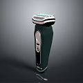 Ergonomic Dark Green Electric Shaver With Metallic Head And Control Button