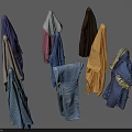 Assorted Hanging Clothes Featuring Various Colors And Styles Like Shirts Coats And Scarves