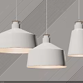 Three White Pendant Lights Hanging From Ceiling Against Diagonal Striped Wall 3d model