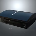 Sleek Black PlayStation Gaming Console With Front Ports And Green Indicator Light