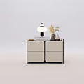 Modern Light Colored Console Cabinet With Dark Frame Table Lamp Vase Plant And Book
