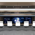 Spacious Monitoring Control Room With Large Display Screens And Rows Of Seats