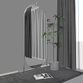Floor Mirror in Modern Room with Tall Green Plant and Gray Curtains