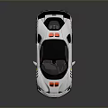 White Sports Car With Black Roof Orange Accents And Rear Spoiler