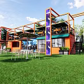 Two Story Orange Container Building With Metal Frame And Outdoor Seating On Green Lawn