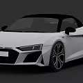 White Audi Convertible Sports Car With Black Soft Top And Sleek Exterior Design