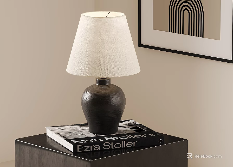 Table Lamp with Dark Ceramic Base and Light Linen Shade on Table with Book 3d model