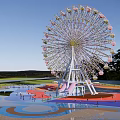 Scenic Amusement Park Ferris Wheel With Colorful Ground And Water Area