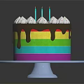 Colorful Rainbow Cake With Chocolate Drizzle White Cream Decorations And Blue Candles On White Plate