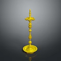Golden Decorative Ornament with Intricate Carvings and Pedestal Base Design