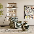 Black and White Striped Single Sofa with Ottoman Green Plant and Floor Lamp in Interior