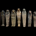 Ancient Egyptian Sarcophagi Collection With Intricate Carvings And Ornate Designs