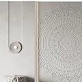 Bed Accent Wall With Intricate Relief Circular Lamps And Stone Tables