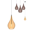 Modern Teardrop Shaped Amber Glass Pendant Lights Illuminated Hanging In Interior Space