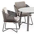 Modern Round Dining Set With Wicker Chairs Beige Cushions And Metal Legs 3d model