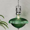 Stylish Green Glass Pendant Lights Featuring Petal Shaped And Ribbed Shades Hanging From Metal Chains