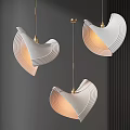 Modern Curved White Pendant Lights With Golden Rod And Warm Glow In Interior