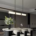 Modern Restaurant Interior With Marble Dining Table Hanging Pendant Light And Floral Arrangement