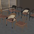 Modern Dining Chairs With Different Designs Metal Frames Rattan Elements And Upholstered Seats 3d model
