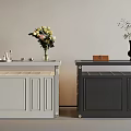 Modern Storage Cabinets In White And Dark Gray With Flower Vases And Decorative Items