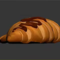 Sculpture Carving Of Three Orange Croissants With Striped Surface Design Details