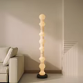 Modern Floor Lamp With Warm Light In Living Room By Light Colored Sofa