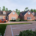 Brick Terraced Houses With Dark Roofs Orange Sports Car Driveway Paved Courtyard And Trees