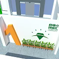 Open Exhibition Space With Green Display Panels And Directional Signage