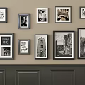 Various Photo Frames With Quotes Portraits Building And Animal Art On Wall