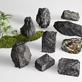 Decorative Rockery Stones In Various Shapes With Green Moss And Small Plants