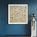 Abstract Painting on Blue Wall with White Frame Gold Beige Grid Squares and Silver Sculpture