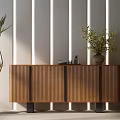 Wooden Entryway Side Cabinet With Vertical Slat Design Black Legs And Potted Plant Decor