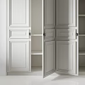 Elegant White TV Cabinet With Stylish Recessed Panel Doors And Sleek Matte Black Metal Handles
