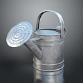 Metal Watering Can With Perforated Lid And Shiny Surface For Garden Use