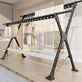 Sturdy Black Metal Clothes Rack With Hanging Clothes Quilt And Lower Storage Shelf