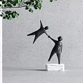 Artistic Sculpture Carving Featuring Two Human Figures Standing And Lifted On Marble Base With Green Leaves
