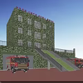 Green Camouflage Fire Station Building With Red Fire Trucks Parked Firefighters And Trees