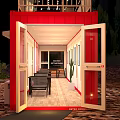 Red Container Building at Night with Outdoor String Lights Plants and Patio Furniture